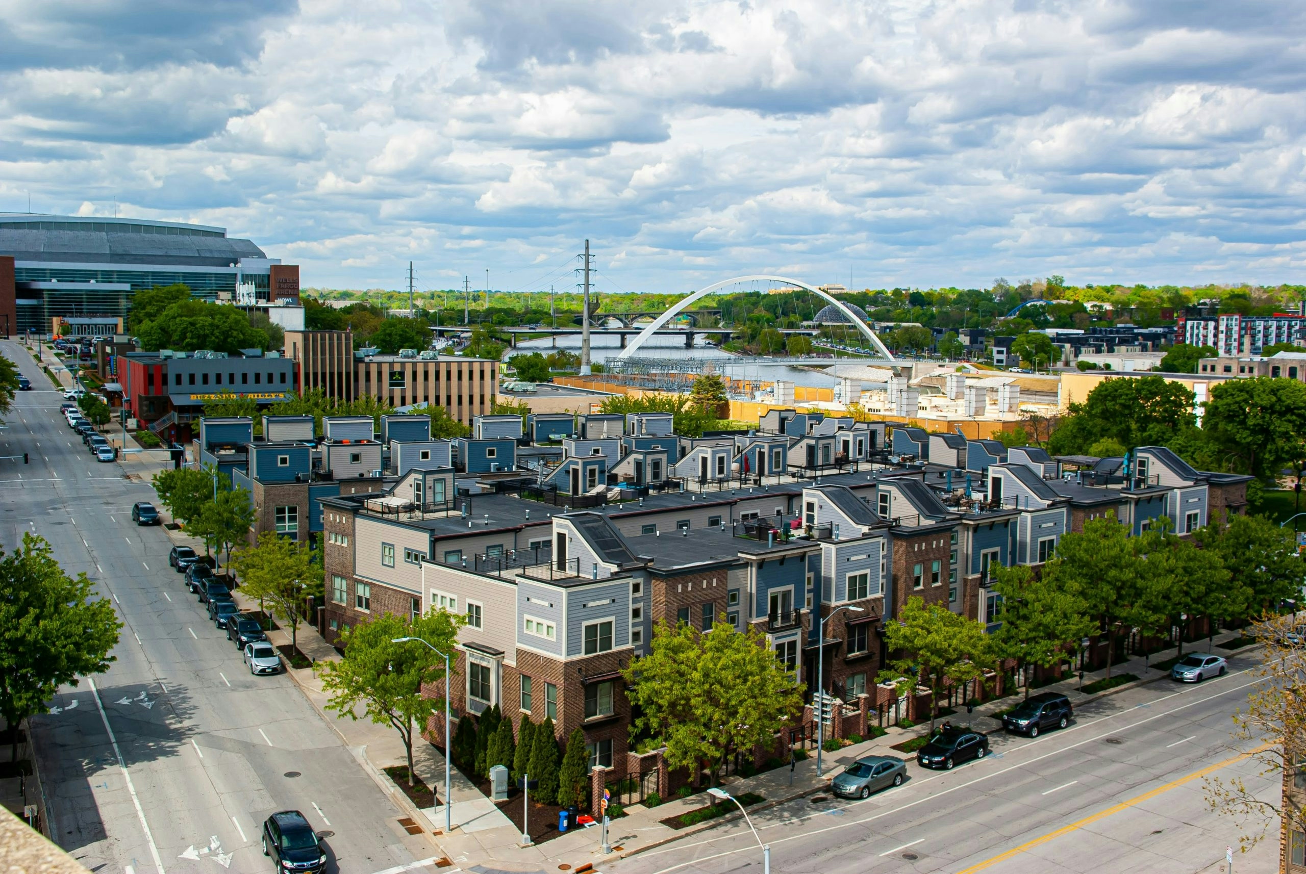Aerial view of Des Moines with urban streets and green spaces