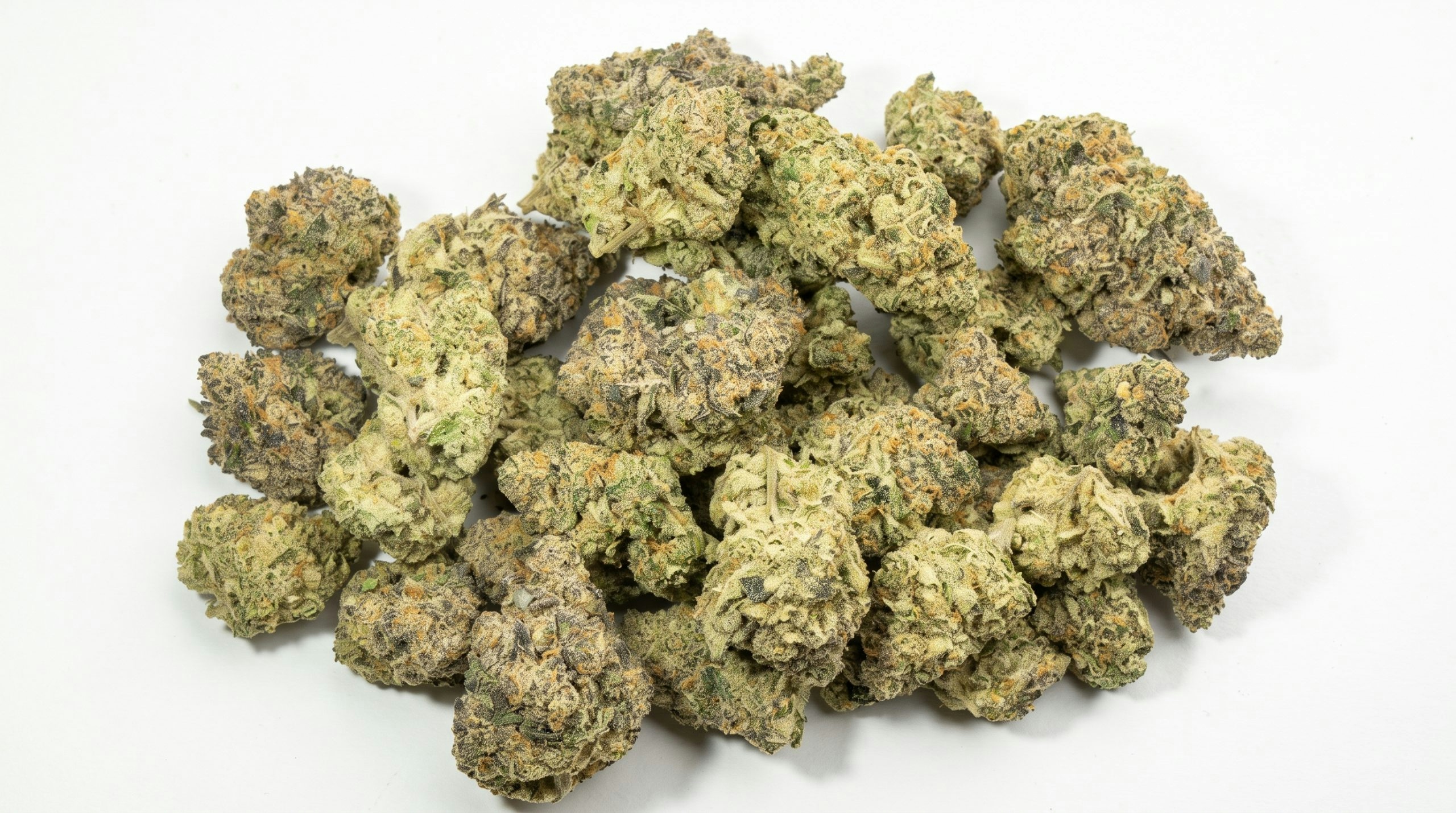 cannabis buds over a white background