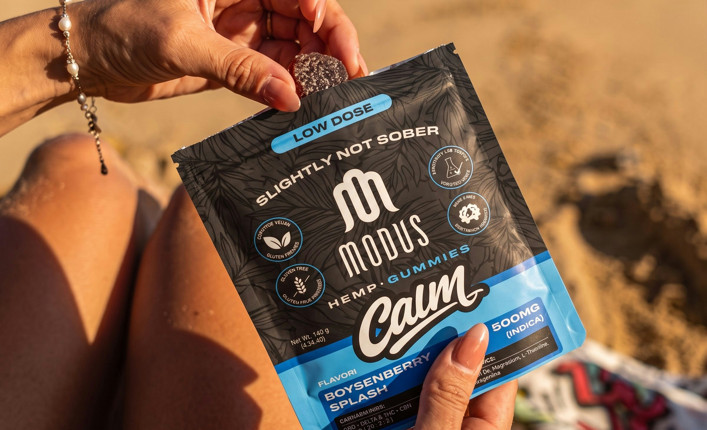 woman grabbing a gummy from modus